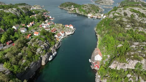view of ny-hellesund's narrow inlets and rocky shores from the sky.