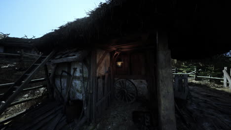 rustic wooden cottage with thatched roof in a serene rural setting at dusk