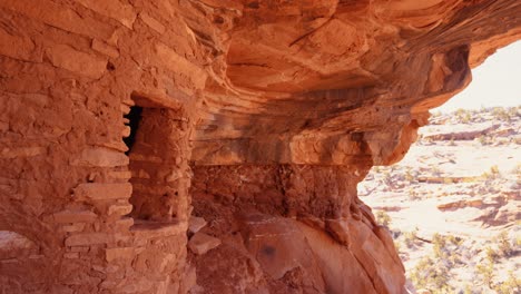 Fallen-roof-pueblo-ruin-close-up-of-window-and-valley-in-Bears-Ears-National-Monument,-Utah