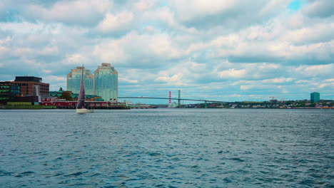 boat tour exploring halifax downtown in nova scotia, canada. waterfront skyline of the city. view of the financial district. sightseeing of halifax.