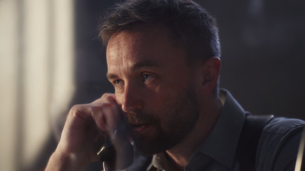 Investigator Showing Crime Scene Photo during Inmate Interrogation