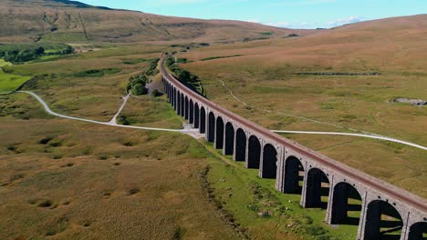 Drone-mavic-mini-3-pro-footage-of-the-Ribblehead-Viaduct,-the-longest-and-the-third-tallest-structure-on-the-Settle-Carlisle-railway-line