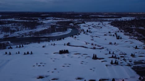 aerial view of nature's beauty of frozen river and fields