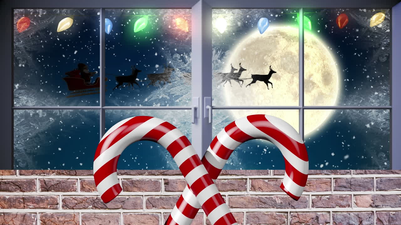 Candy cane icon over fairy lights over window frame against snow falling on winter landscape