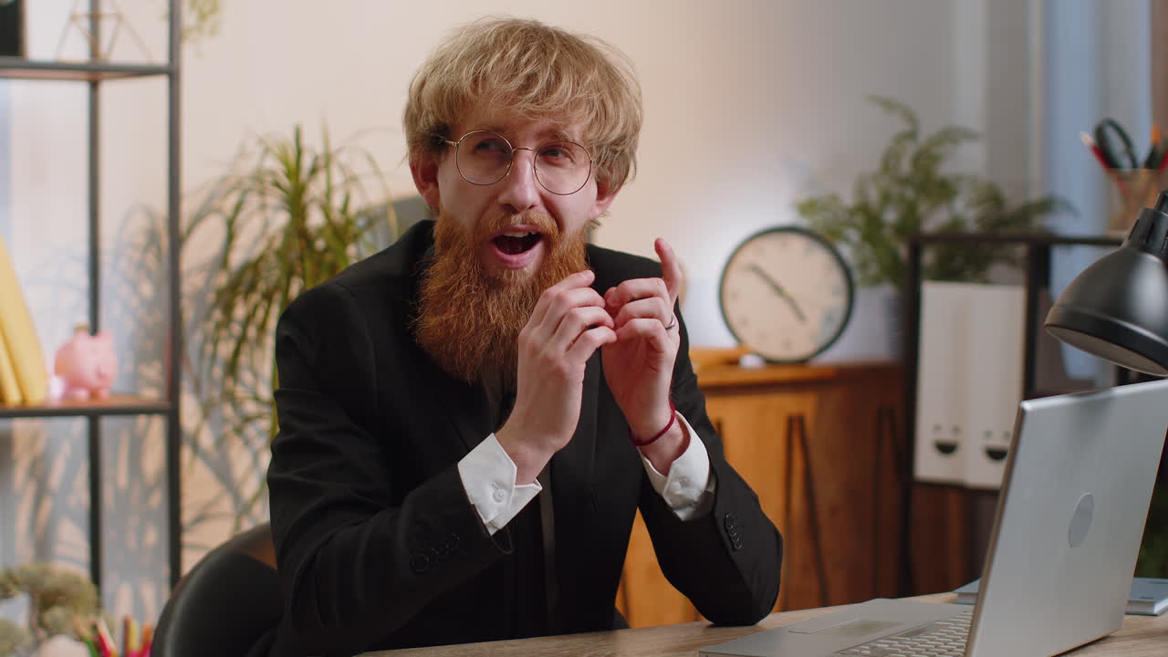 Excited amazed businessman touching his head show explosion looking worried and shocked good idea