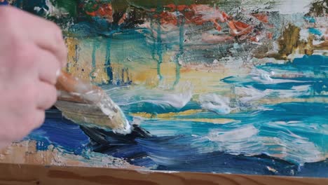 a contemporary artist who creates abstract works of art in the art nouveau style - close up of oil painting. a contemporary artist who creates abstract works of art in the art nouveau style. super slow motion