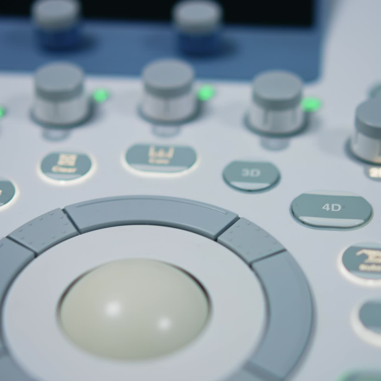 Round rotating button on the keyboard of modern medical equipment. Numerous buttons to manage machine for ultrasound diagnostics