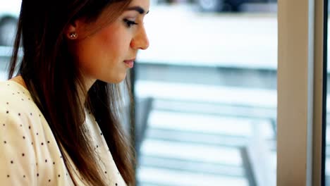 attentive businesswoman using laptop