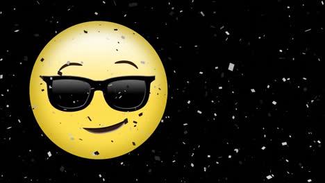 Animation-Von-Konfetti,-Das-über-Emoji-Mit-Sonnenbrille-Auf-Schwarzem-Hintergrund-Fällt