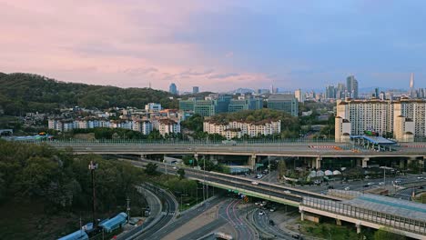 seoul scenic panoramic aerial view at sunset of seocho-gu umyeon tunnel entrance with urban cityscape
