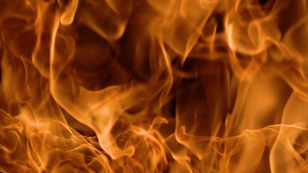 Flames of fire on black background in slow motion