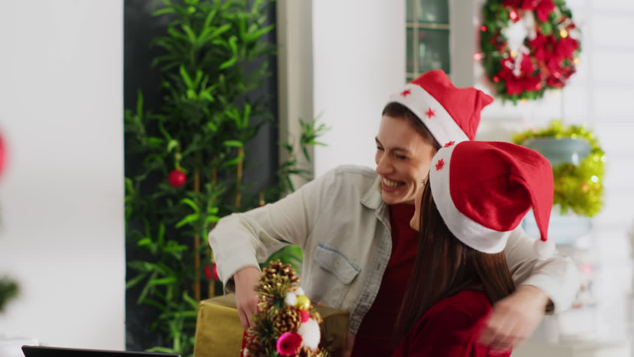 People celebrating Christmas in the office