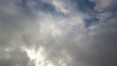Camera looking up with fast moving clouds in the sky, Timelapse 4k
