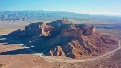vast desert landscape with majestic mesas and rock formations