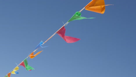 many flags on the wind waving beach decoration close-up