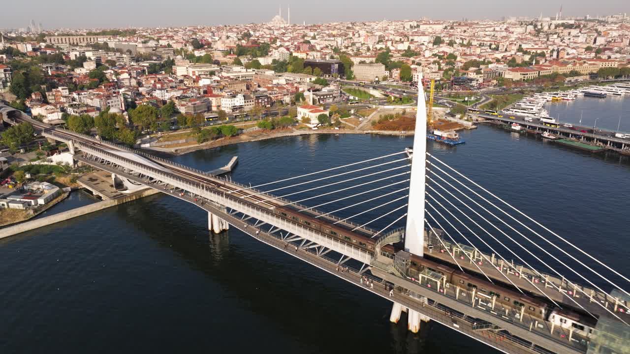 Istanbul Metro Subway Train Arriving at Station on Golden Horn Metro Bridge. Turkey