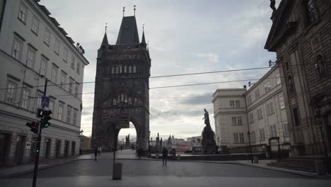 old town bridge tower in prague, czech republic, gimbal side walking wide angle view