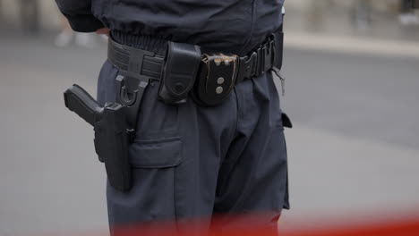 police officer's duty belt with holstered handgun