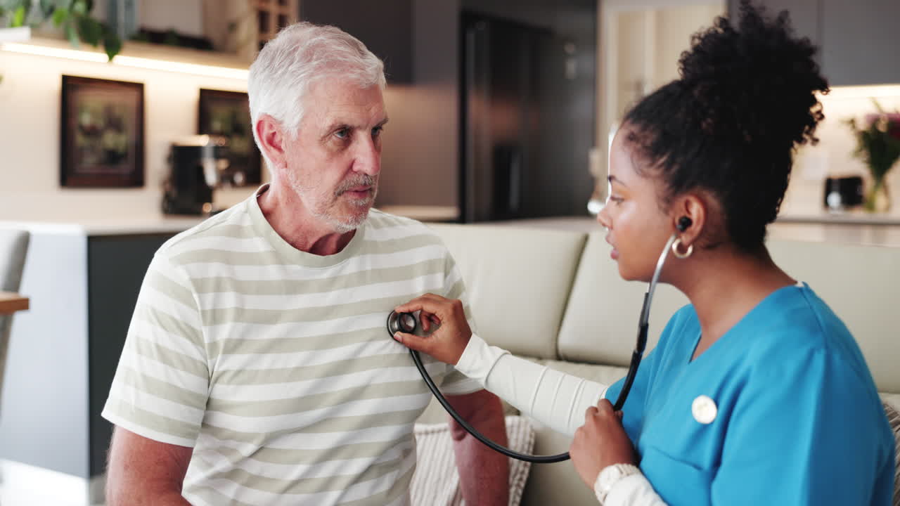 Nurse Performing Medical Checkup on Senior Man with Stethoscope