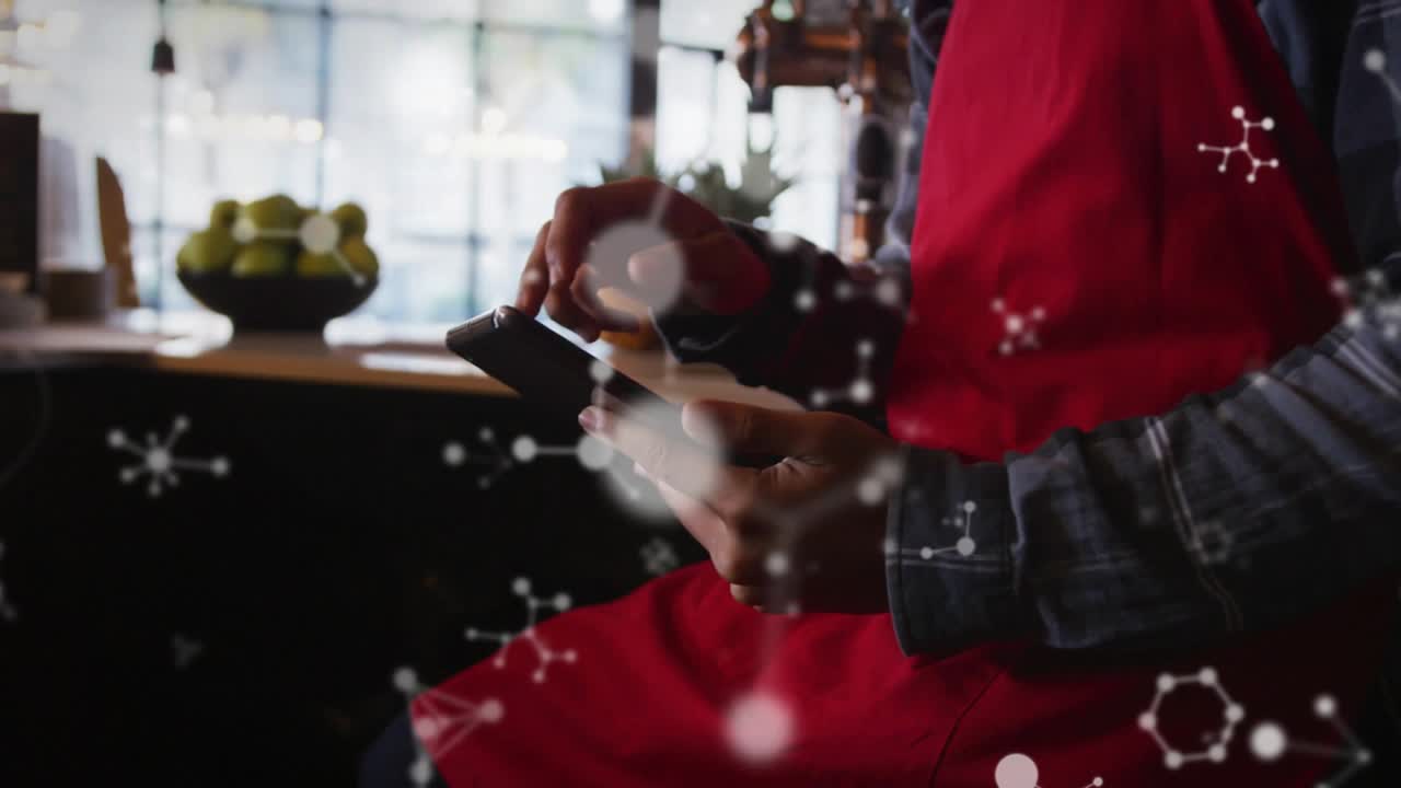 Barista tapping phone, checking orders, activating overlays around hands, adjusting grip near fruit