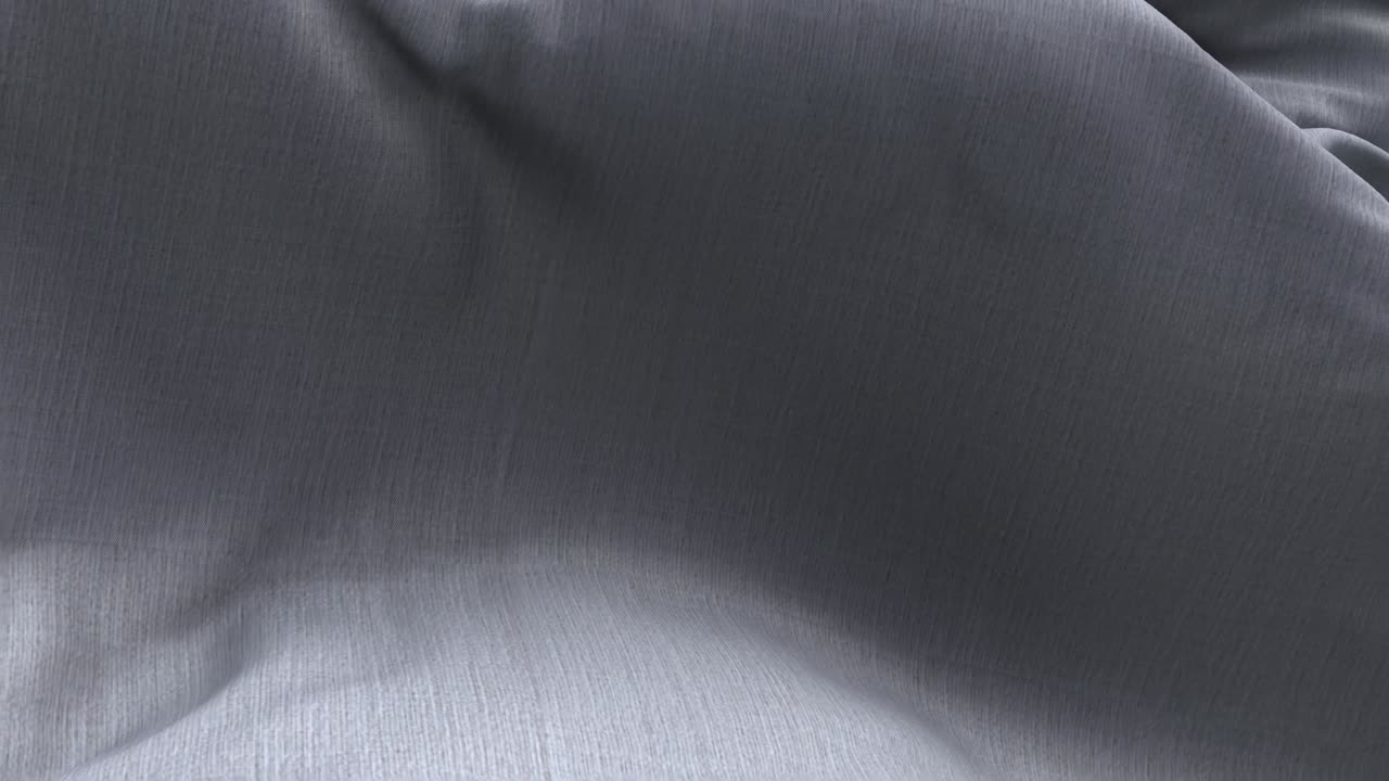Material de tecido cinza abstrato ondulando suavemente