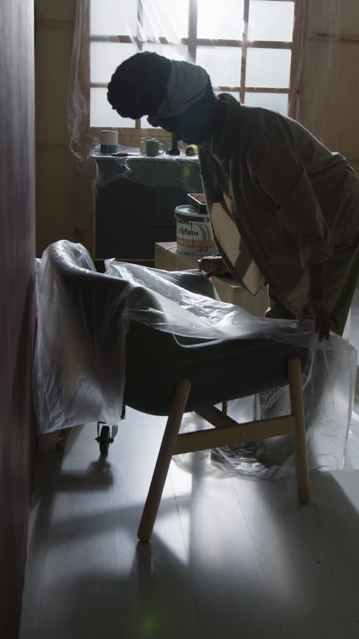 Photos of a person working on a chair in an interior space