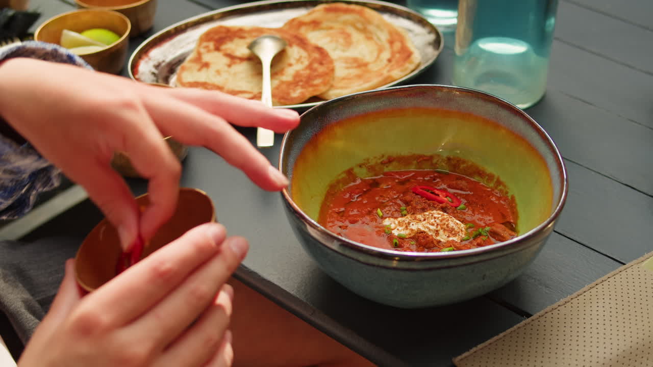 Enjoying a Delicious Indian Meal Outdoors