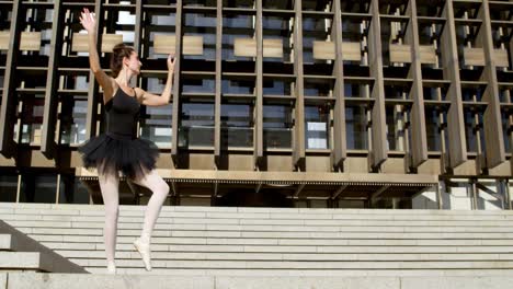 Female-ballet-dancer-performing-on-stair-4k