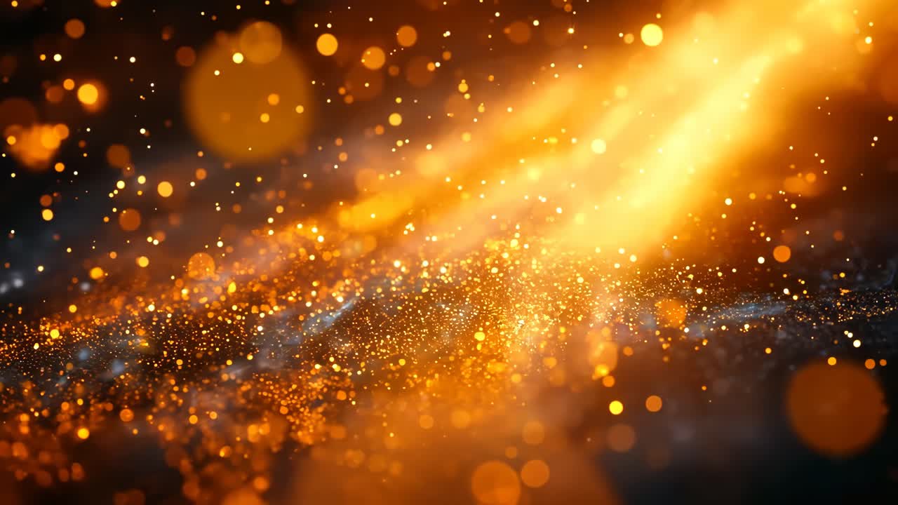 A bright orange light is shining through a dark background, creating a sense of warmth and energy. The light is scattered throughout the scene, creating a dreamy, ethereal atmosphere