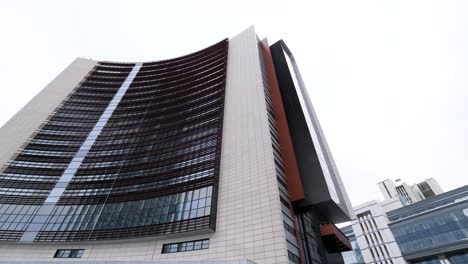 modern curved building in city