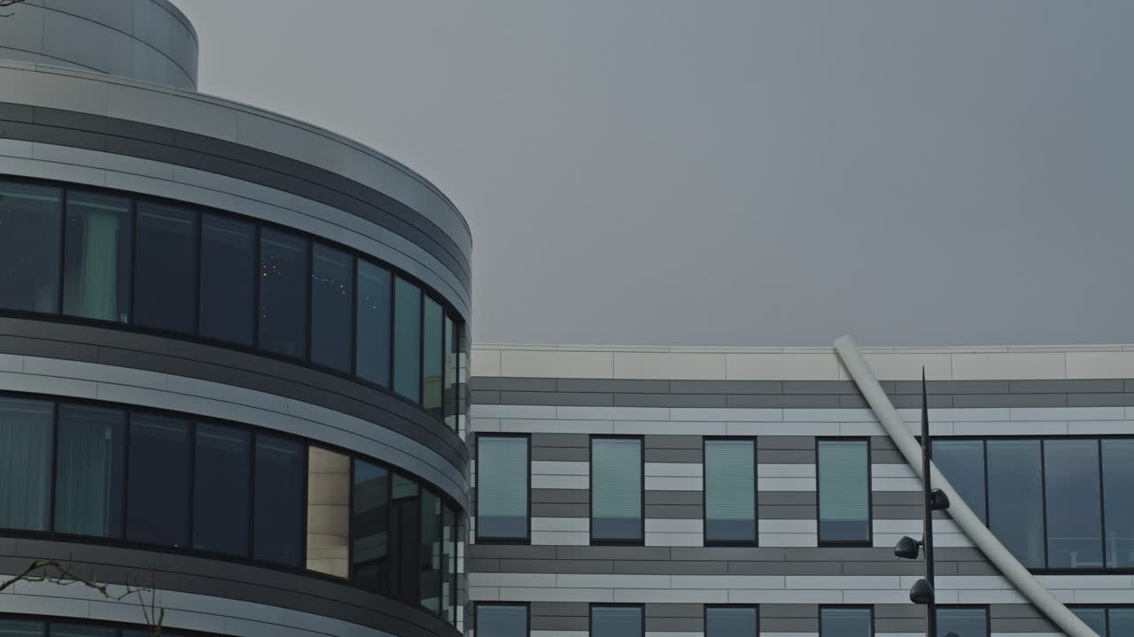 Low angle view of beautiful office building with a lot of windows