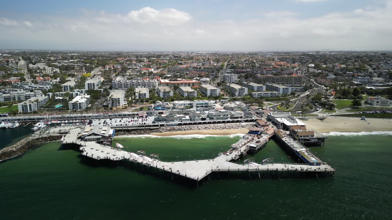 Aerial 4K drone footage of Redondo Beach Pier in Los Angeles, California, showcasing the Pacific Ocean, coastline, marina, and iconic waterfront landmark from scenic elevated views