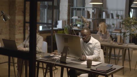 employees working on computer in the office 1