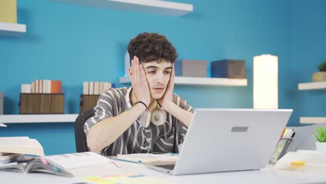 the student who made a mistake. he does something wrong on the laptop and gets upset.