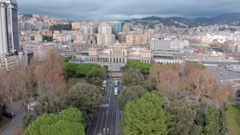 Aerial-approach-shot-toward-Genova-Brignole,-historic-Genova-metro-station-located-on-Piazza-Verdi-in-Italy