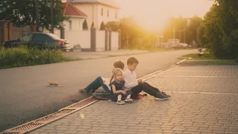 nervous schoolboy throws textbook on grey asphalt road