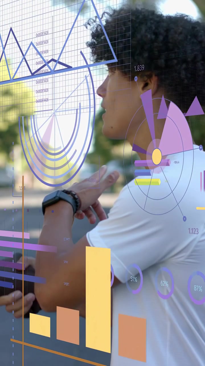Vertical video: Man in white T releasing grip gesturing down curb, showing tech charts around wrist