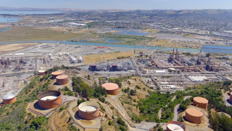 industrial chemical storage tanks along the san francisco bay could be of environmental concern - aerial flyover