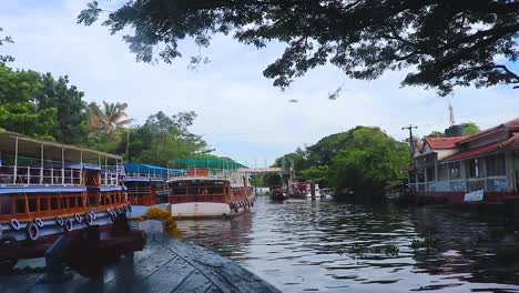 water boat many parked in sea backwater harbor with cloudy sky at morning video taken at alappuzha or alleppey backwater kerala india.