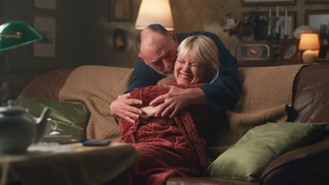 elderly couple enjoying time together at home