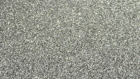 top down sparkling and shiny silver glitter background.