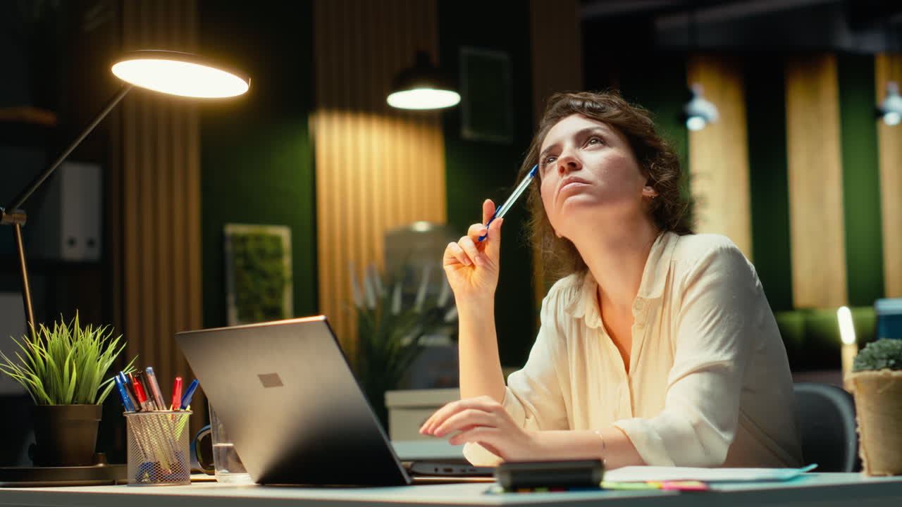 Vertical Video Businesswoman wondering about possible solutions to a dilemma with laptop
