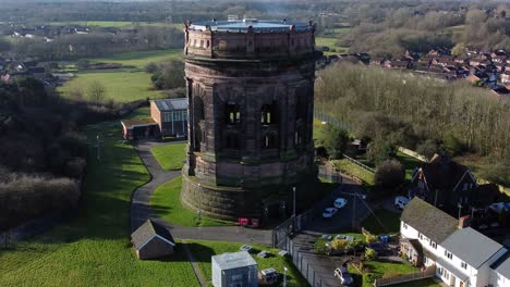 aerial view national trust norton water tower landmark runcorn victorian architecture england rural scene orbit left