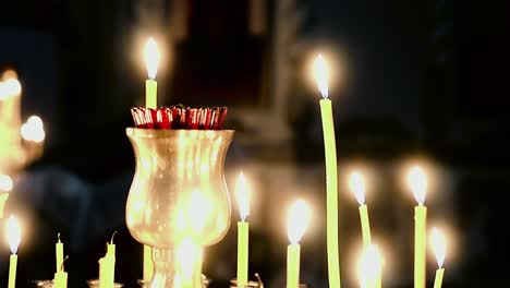 candles burning in a candlestick
