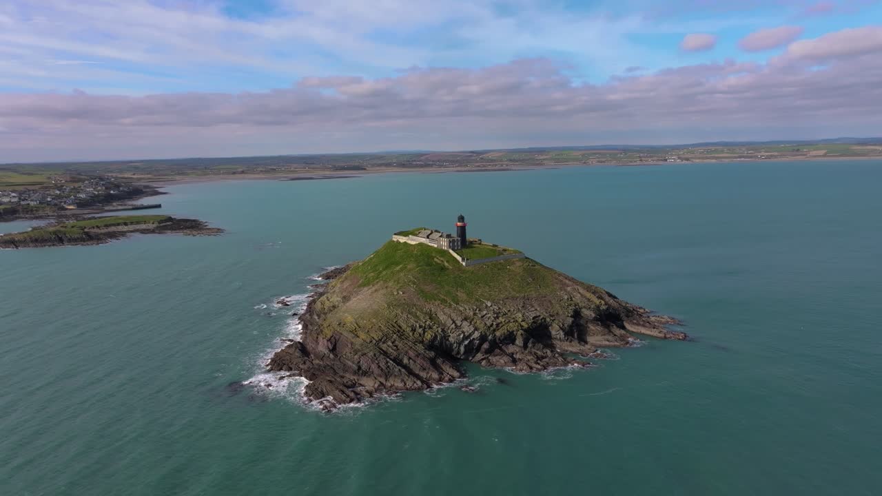 4K Cinematic Drone shot of the black Ballycotton Lighthouse overlooking the Atlantic Ocean, a symbol of Ireland’s maritime heritage Co.Cork - Ireland_13