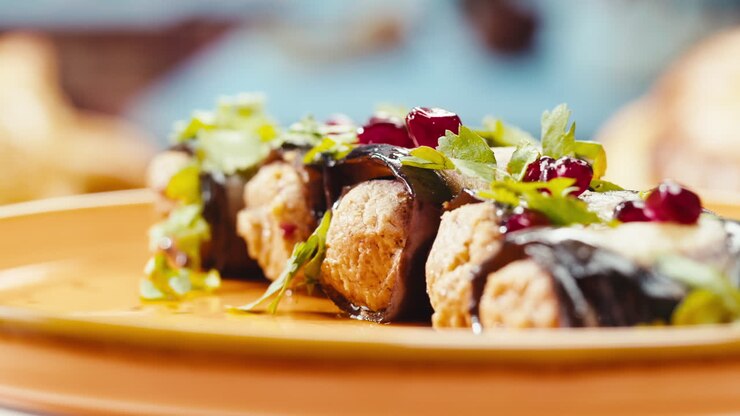 Rouleaux d'aubergine farcis à la grenade