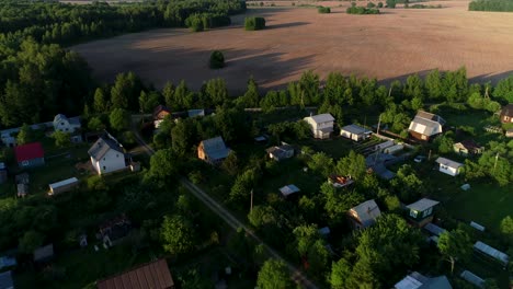 beautiful small village near agricultural field in a beautiful green forest.