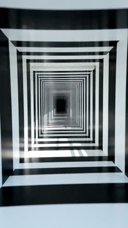 black and white striped optical illusion tunnel