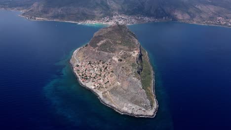 panoramic drone shot of monemvasia town at the east coast of the peloponnese surrounded by myrtoan sea, greece