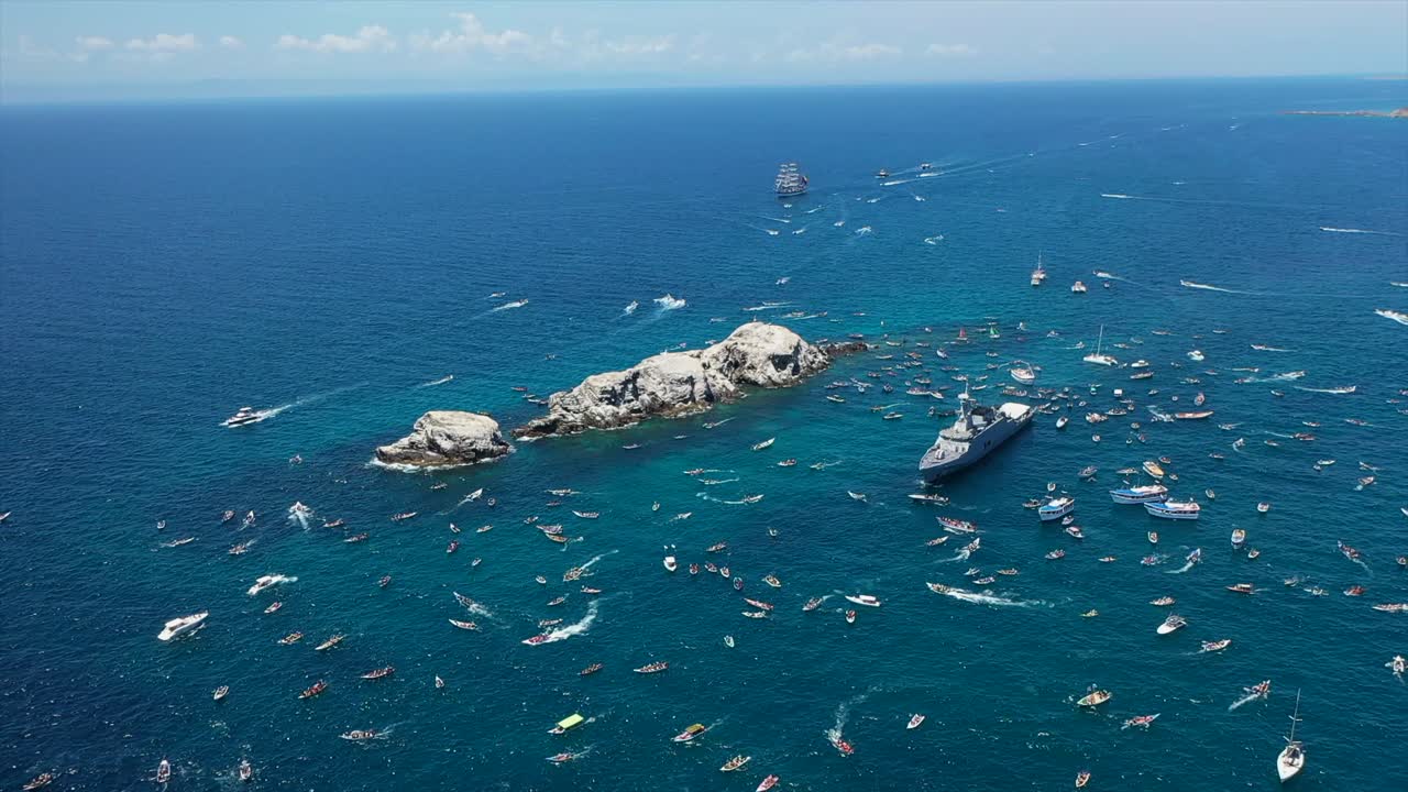 Boats gather for a vibrant religious procession near Margarita Island